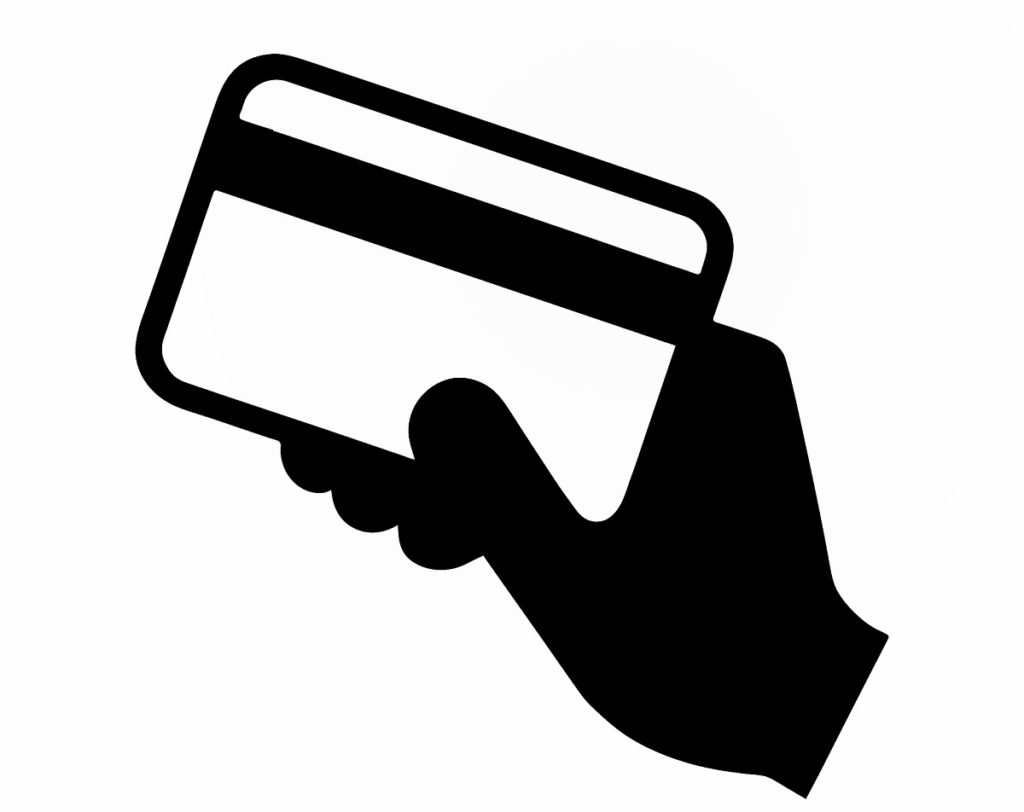 Hand mit einer Kreditkarte